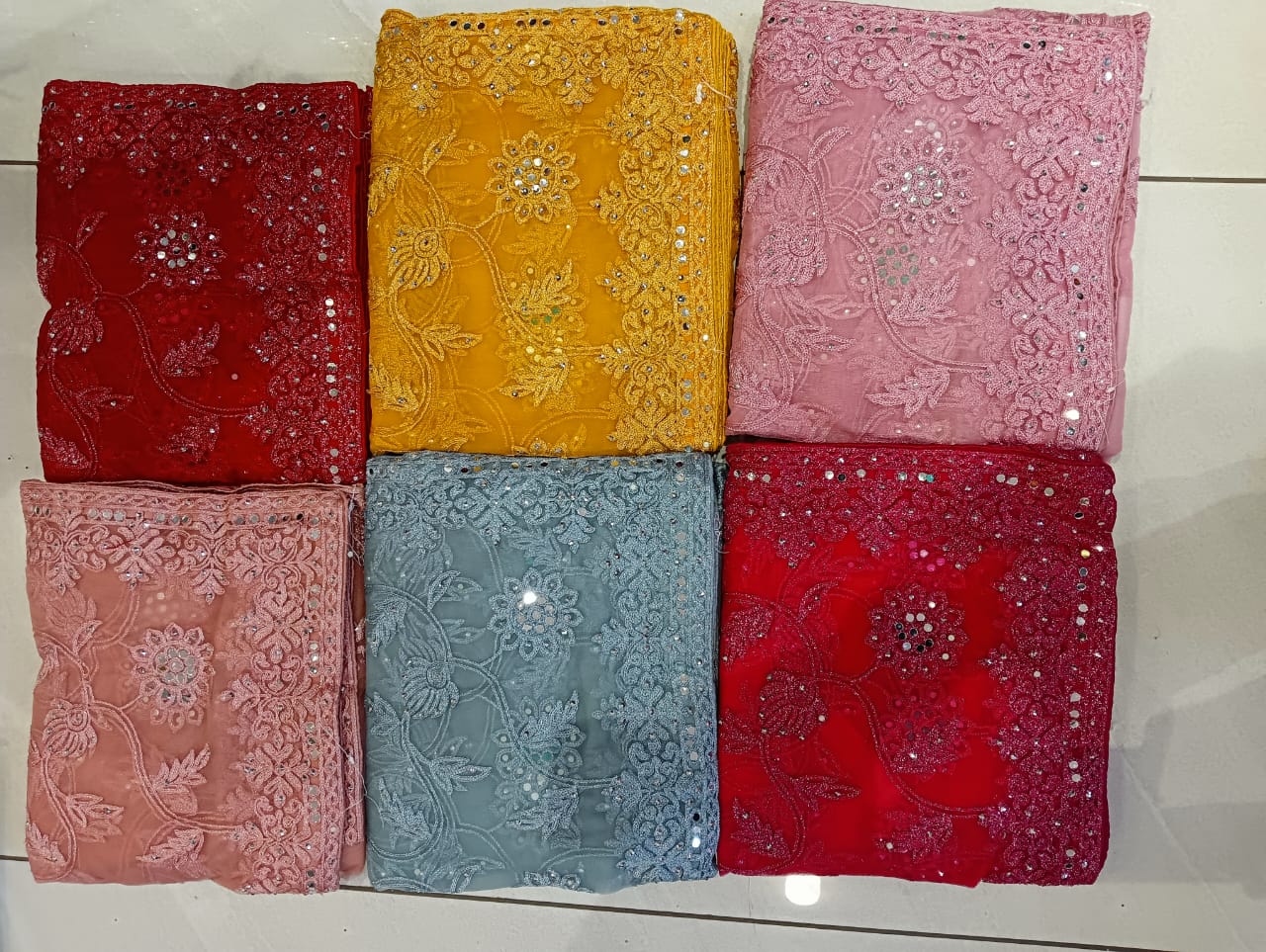 M.l.s Fancy net work saree set of 6 pic